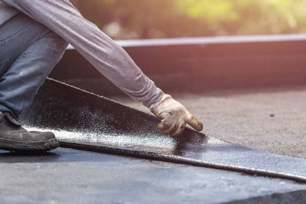 Professional Basement Waterproofing technician working in Benton, KS